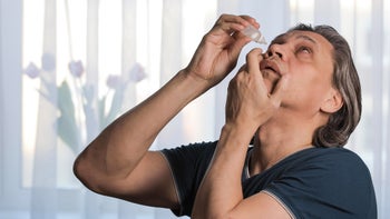 autoimmune: sjogren's: applying eye drops 1307718507