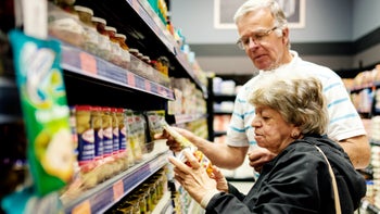 Parkinson's disease: senior couple grocery shopping 1171599549