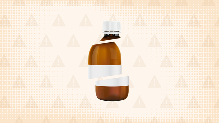 In the center of a light tan background with texture and warning sign pattern is a brown medicine bottle cut into thirds. 