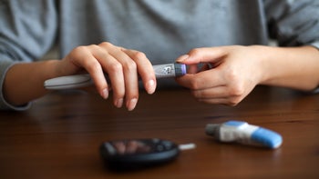 Diabetes: Insulins: closeup winding up insulin pen 645398140