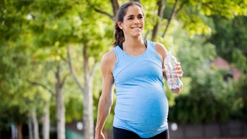 Women's health: Pelvic floor: Pregnant person walking: GettyImages 475106092