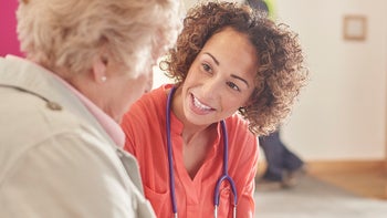 nurse talking with patient-516214168