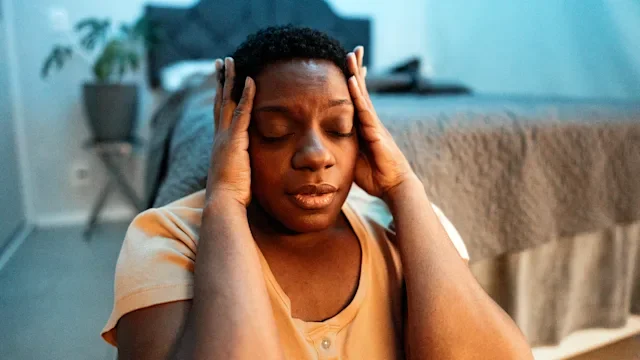 Mental-health: emotional woman sitting on bedroom floor 1678861983