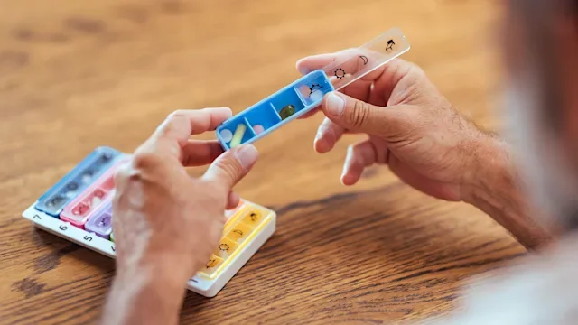Medication Education: closeup pill organizer 2165132981