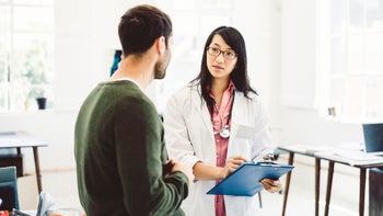 Parkinsons-disease: man at medical appointment 641968570