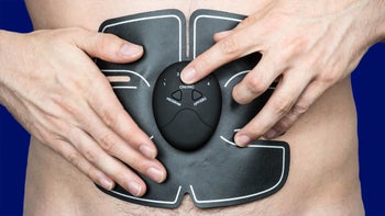 Movement-exercise: closeup ab stimulator 1021707260