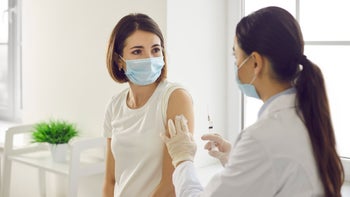 Vaccine: Johnson and Johnson: hcp talking to patient before vaccination 1304852809