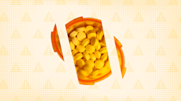 An overhead photo of pills in a prescription bottle appears fractured into three pieces.
GoodRx Health