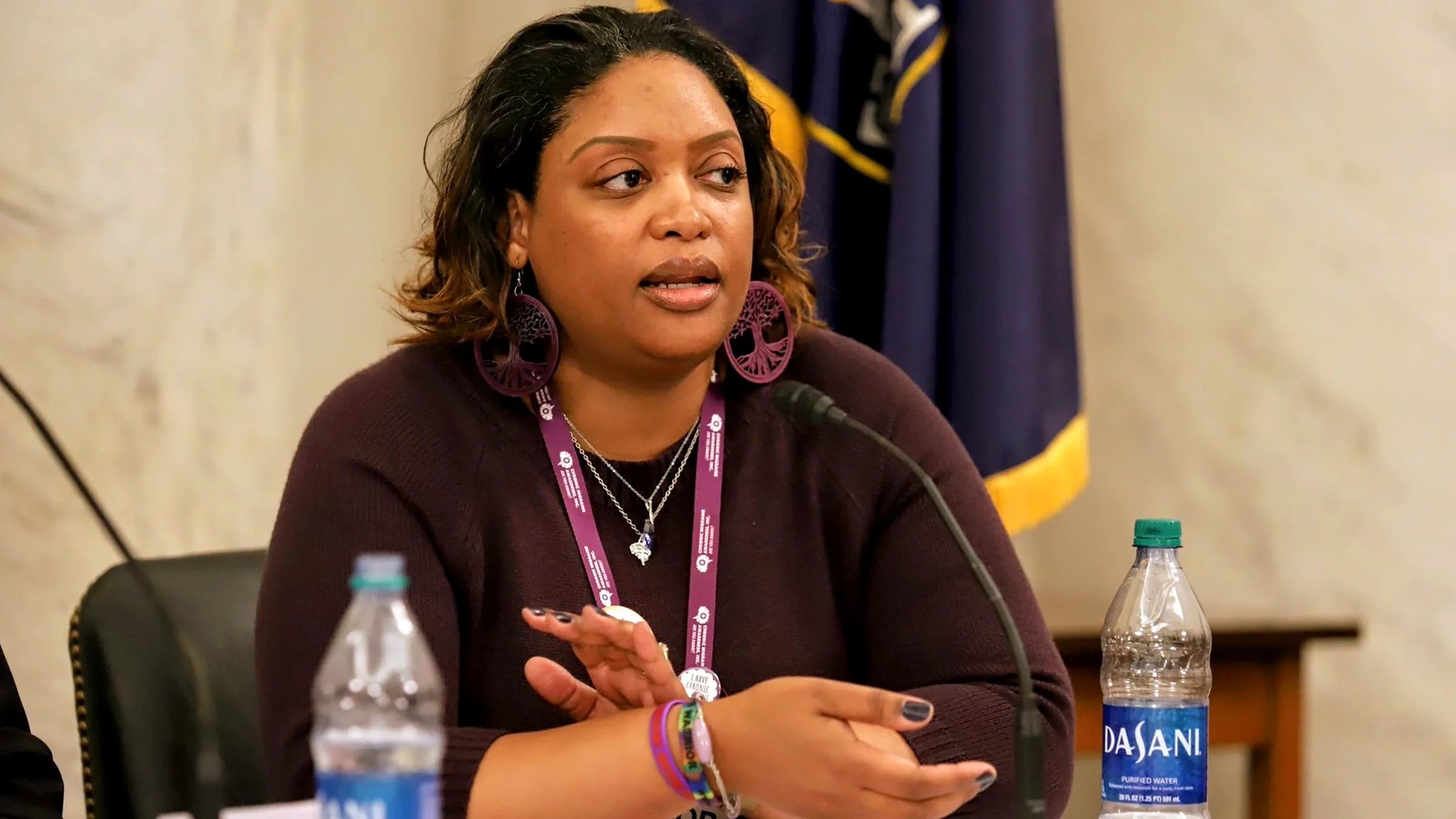 Migraine patient advocate Jaime Sanders speaking.