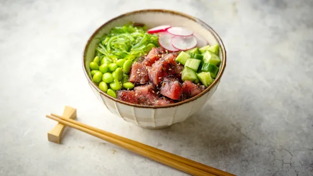 Diet Nutrition: tuna poke bowl on table 2157178532