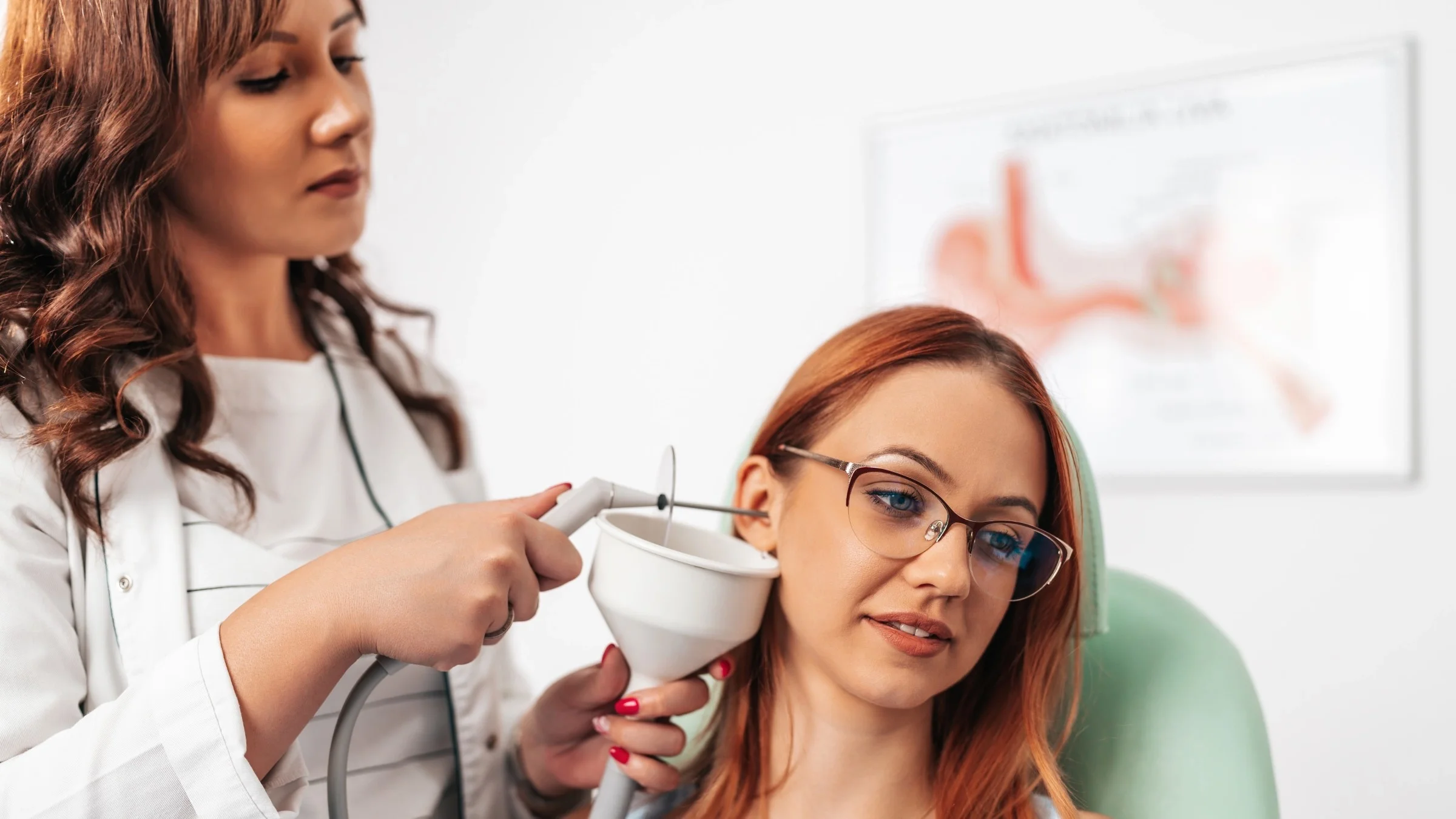 A doctor conducting ear irrigation.