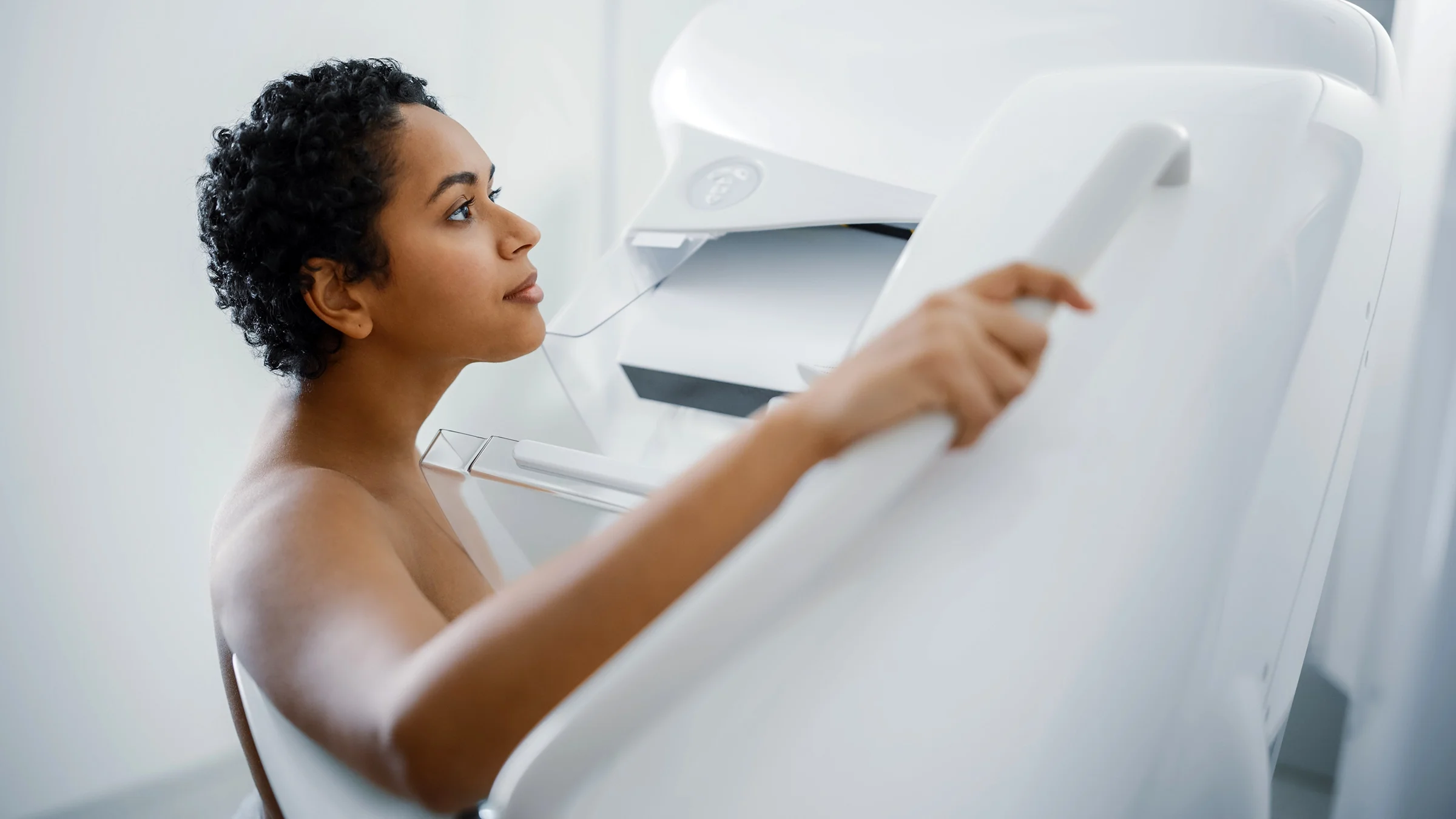 A woman gets a mammogram. Black women with breast cancer have a higher mortality rate than women from other ethnicities.