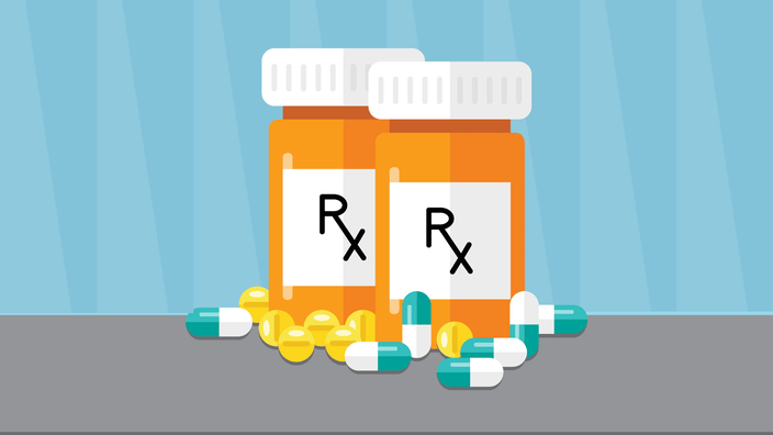 Prescription bottles with pills