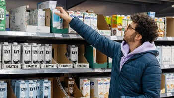 diet-nutrition: man buying plant based milk 1371981271