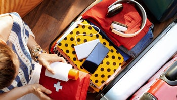 Medication education: Travel first aid: packing first aid kit in suitcase-1155566546