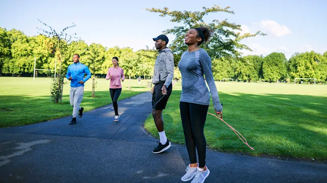 movement-exercise: group working out in a park 864438536