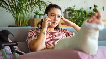 Medical debt: 	worried phone call cast on foot 1284034461.jpg