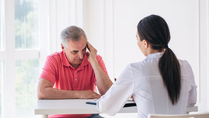 A patient talking to their doctor.