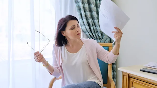 Health: Menopause: woman hot flashes-1318808446