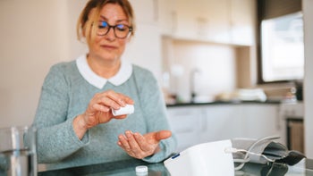 Metoprolol: woman checking blood pressure 1307592547