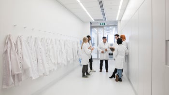 HCP: Rotation: doctors white room circled up talking-1201227994