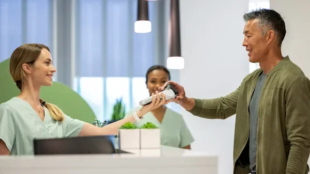 Diagnostics: patient paying at front desk 2239536487