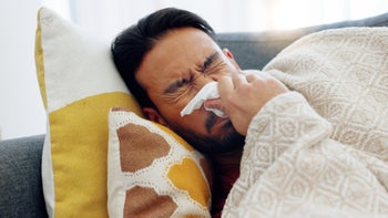 Allergies: man blowing nose 1816351356