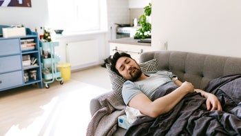 Health: Gastrointestinal infection: man sick at home 1141394531