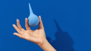 Health: Constipation: closeup enema blue background 1438477774