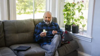 Vumerity: man taking medication 1321345865