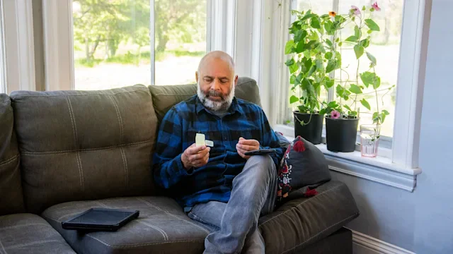 Vumerity: man taking medication 1321345865