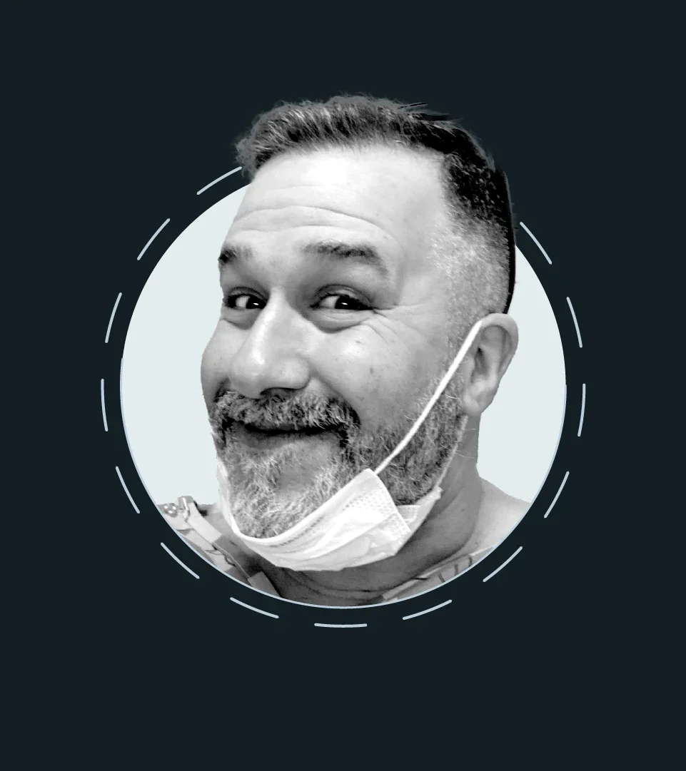 Tom Hartos is pictured in a headshot.