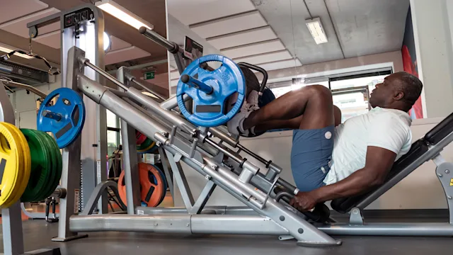 Movement-exercise: senior man leg press exercise 1322650754
