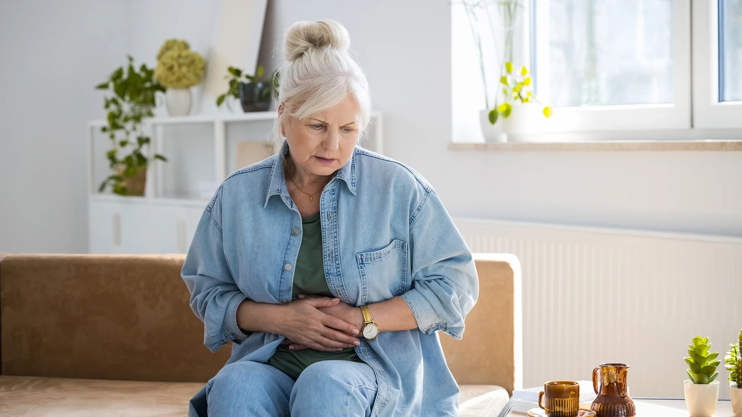Woman with stomach pain.