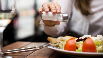 Hypothyroidism: Iodine deficiency: sprinkling salt on food-894980468
