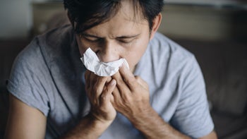 Flu: man blowing his nose 1251325744