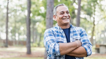 Health: Substance use disorder: portrait smiling man woods-1169241965