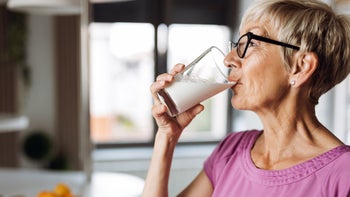 diet-nutrition: mature-woman-drinking-milk-1324574648
