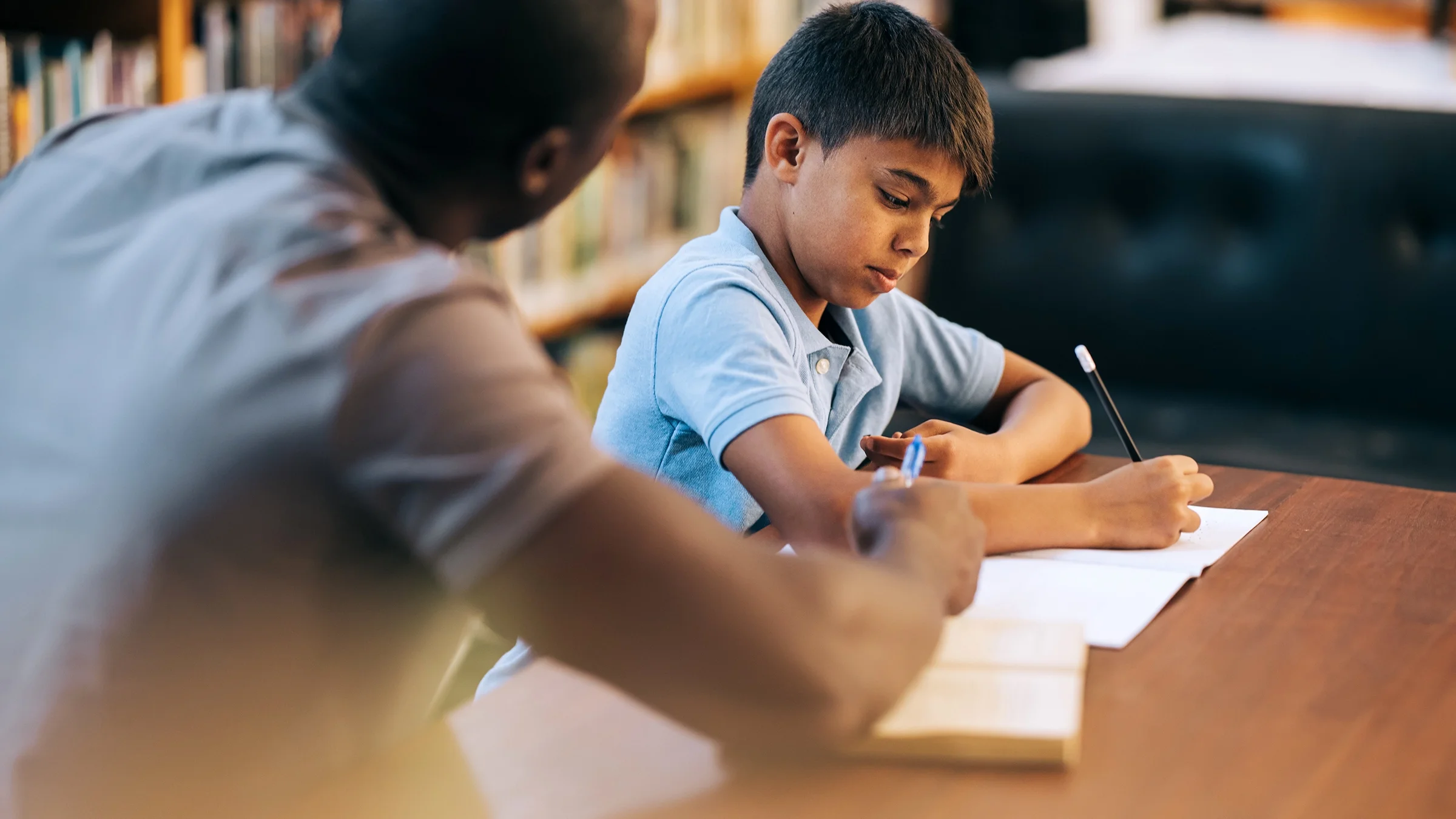 A student gets a private lesson with his teacher.