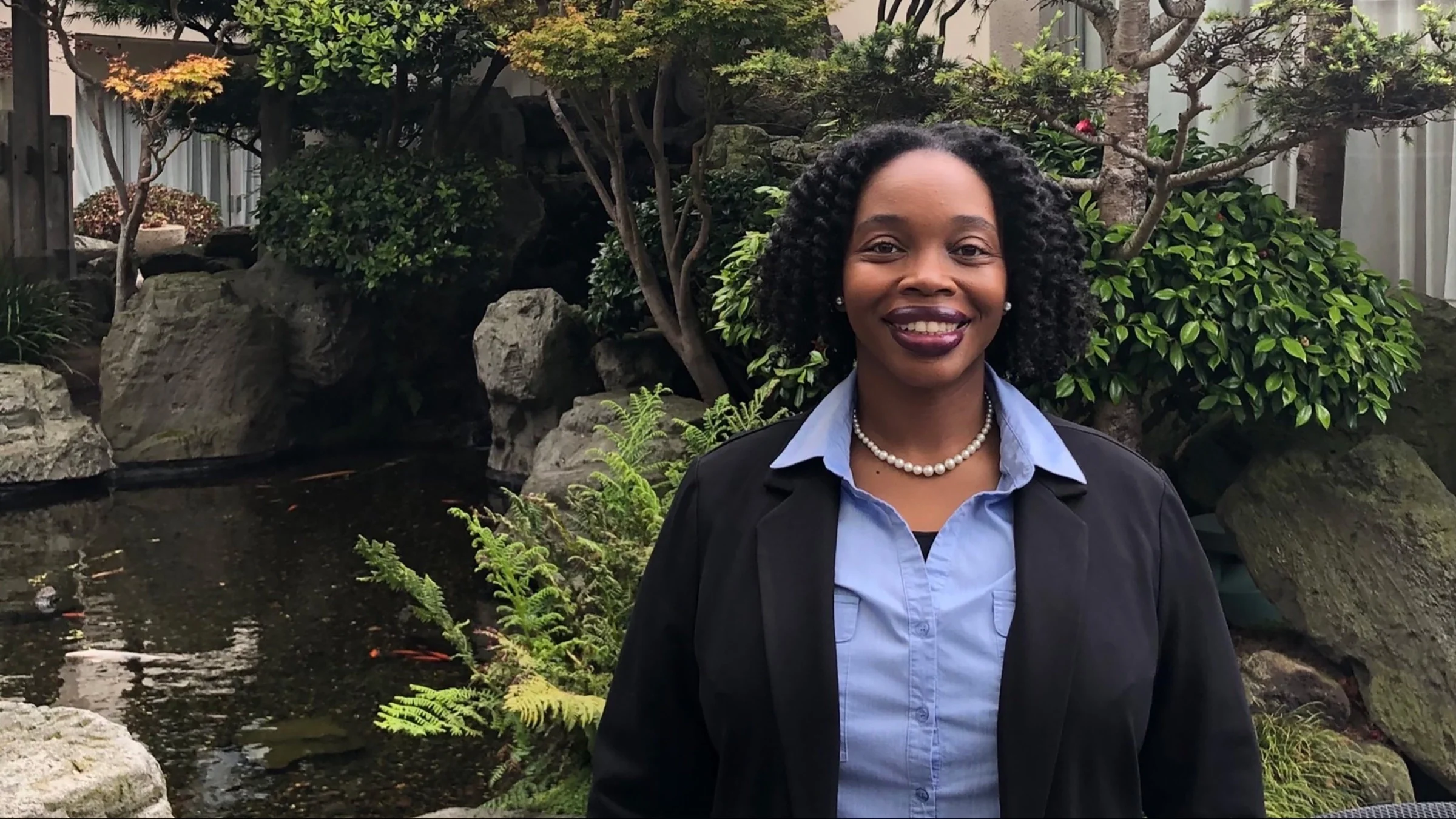Environmental portrait, outdoors, of diabetes advocate Phyllisa Deroze.