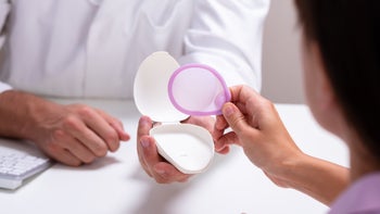 Birth control: Diaphgram: doctor patient going over diaphram-1176206472