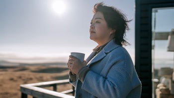 Diet Nutrition: woman drinking coffee outdoors 2159087898