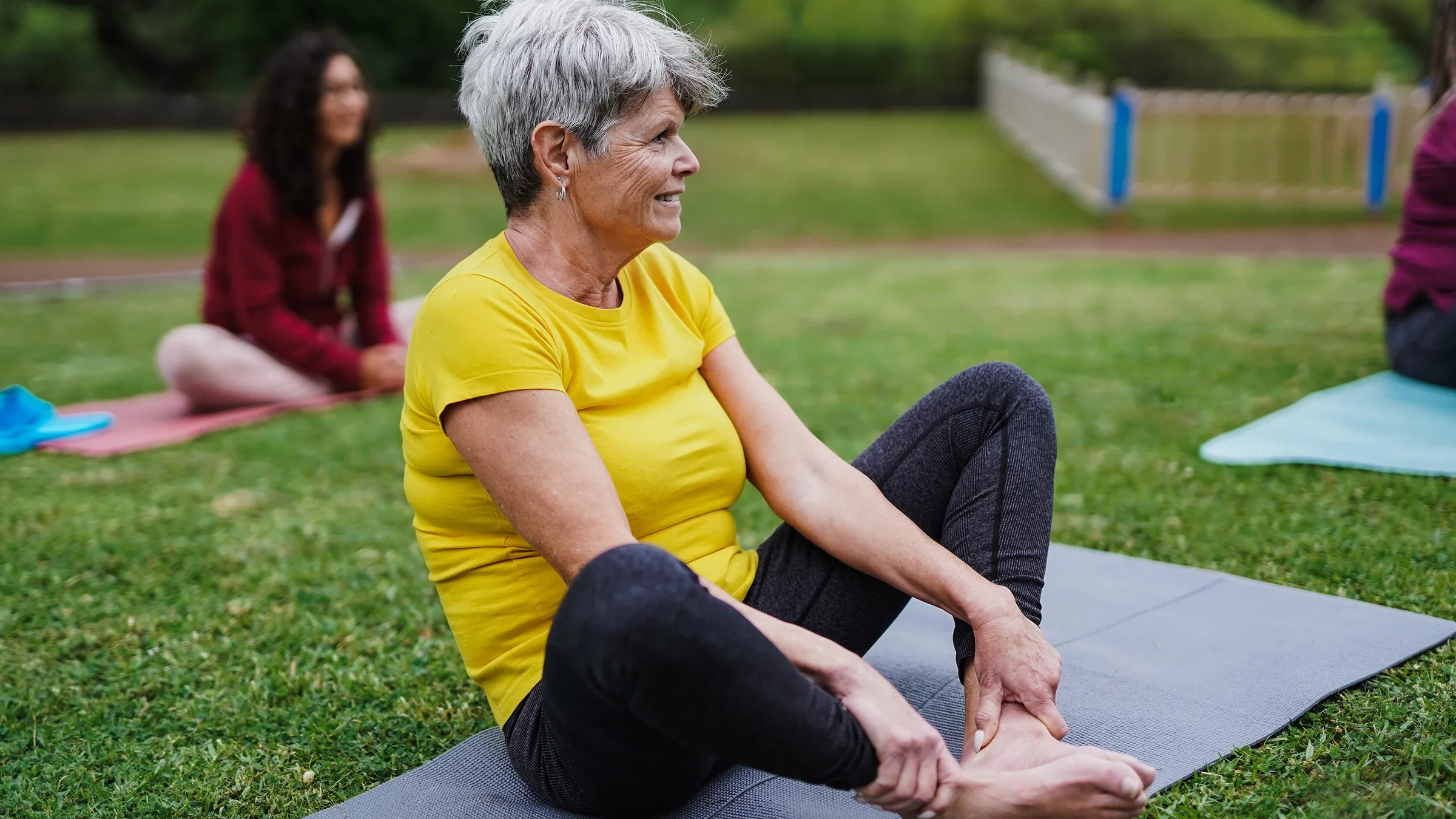 A woman is practicing yoga in the park.
Sabrina Bracher/iStock via Getty Images Plus   