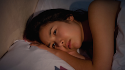 A person awake in bed, having trouble sleeping.
Wavebreakmedia Ltd/Wavebreak Media via Getty Images Plus