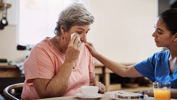 Mental health: senior woman crying 1063720668