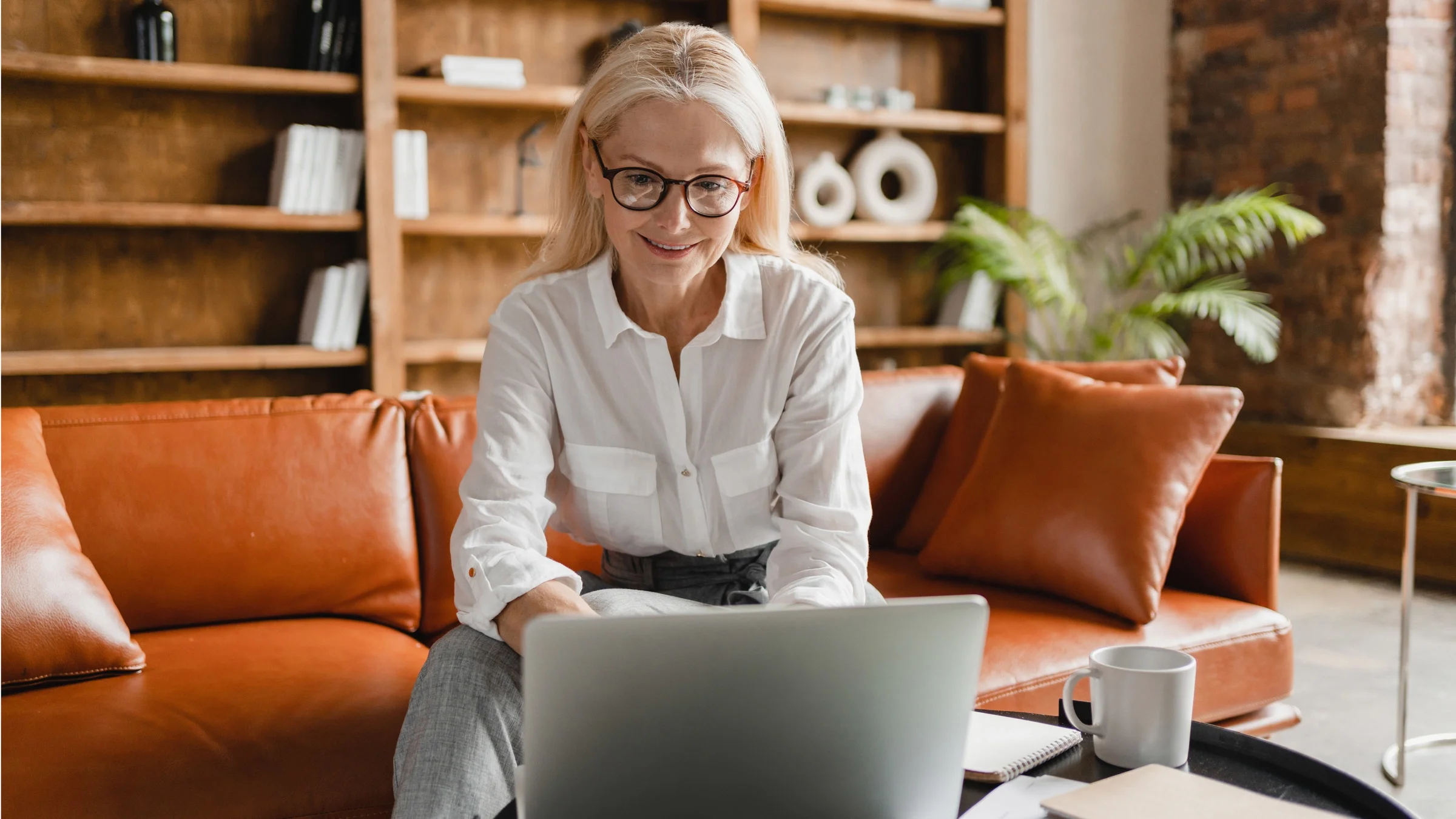 A woman working on her laptop. 