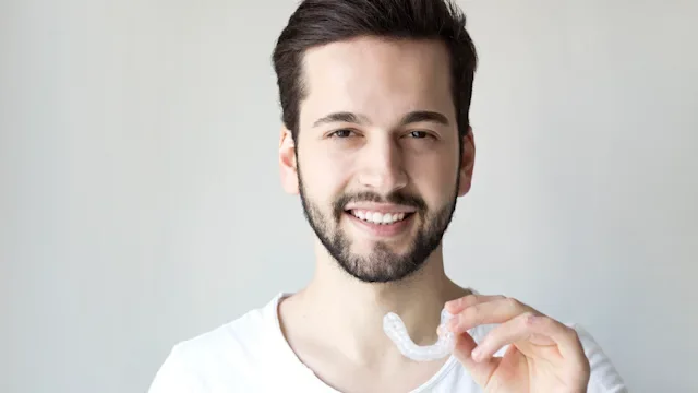 Health: Dental care: portrait man with mouth guard-1204391867