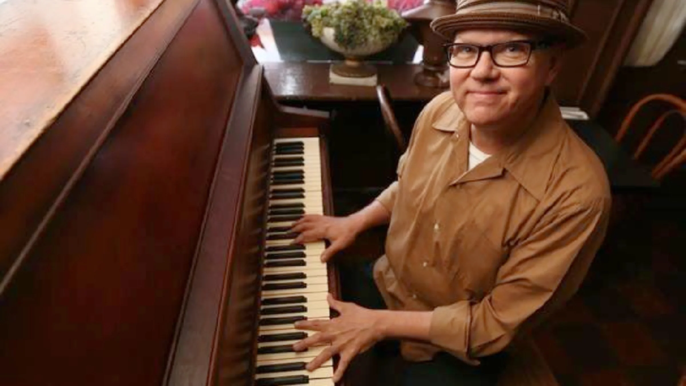 Musician Ricky Nye is pictured at his piano.