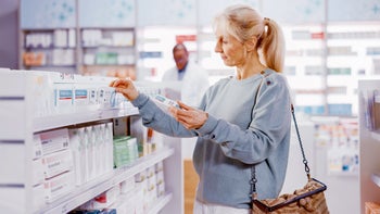 Health: FSA HSA: woman browsing pharmacy-1325914353