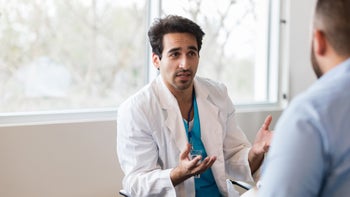 ketamine: doctor speaking to patient 1140610948